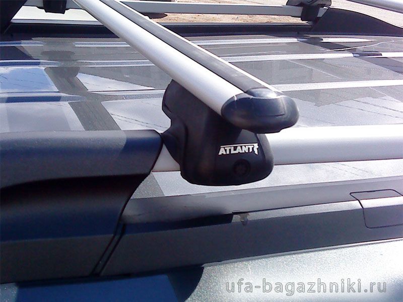 Багажник на крышу Hyundai Tucson, Атлант, аэродинамические дуги на рейлинги