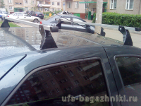 Багажник на крышу на Renault Logan (Атлант, Россия), алюминиевые дуги