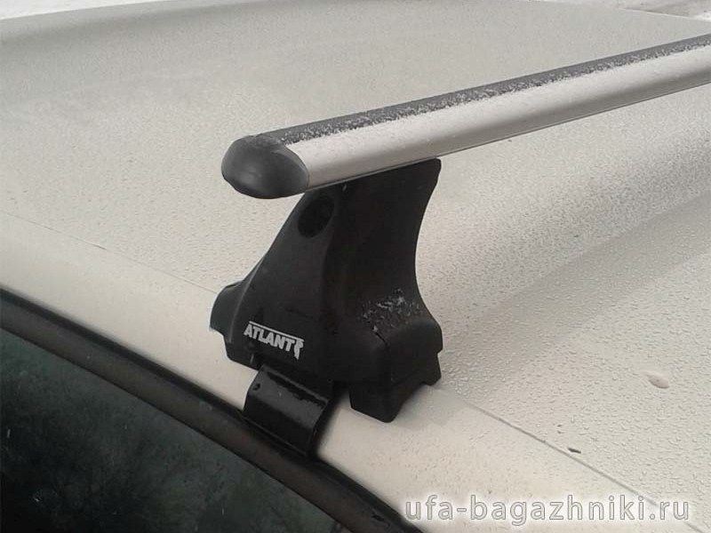 Багажник на крышу Volkswagen Golf 7, Атлант, аэродинамические дуги, опора Е