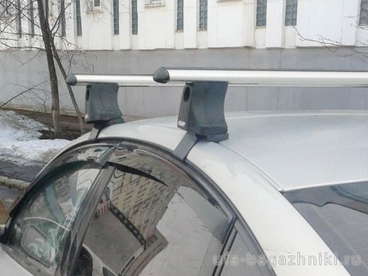 Багажник на крышу Volkswagen Passat B5, Атлант, аэродинамические дуги