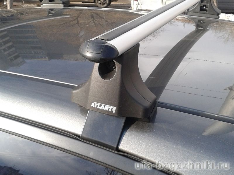 Багажник на крышу Toyota Auris E150 2006-12, Атлант, аэродинамические дуги