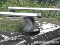 Багажник на крышу Hyundai Solaris hatchback, Атлант, аэродинамические дуги, опора Е