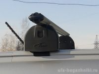 Багажник на крышу Geely Atlas 2017-..., Lux, аэродинамические дуги (53 мм) на интегрированные рейлинги