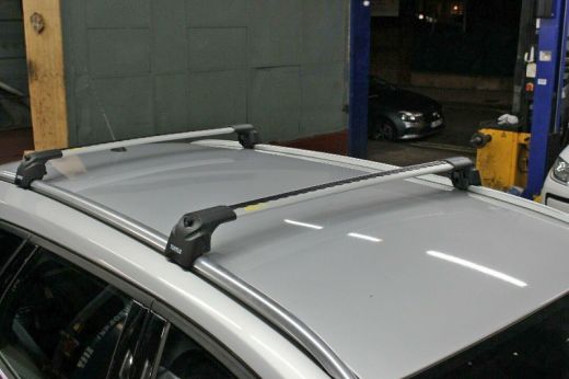 Багажник на крышу Ford Focus 3 sw universal 2011-..., Turtle Air 2, аэродинамические дуги на интегрированные рейлинги (серебристый цвет)