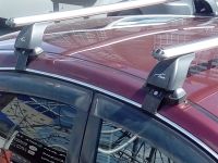 Багажник на крышу Nissan Almera 2012-..., Lux, аэродинамические дуги (53 мм)