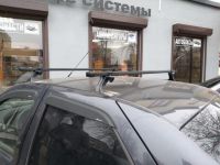 Багажник на крышу на Renault Logan / Renault Sandero (Delta, Россия), стальные дуги