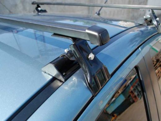 Универсальный багажник на крышу Муравей Д-1, на Mitsubishi Lancer 10, стальные прямоугольные дуги