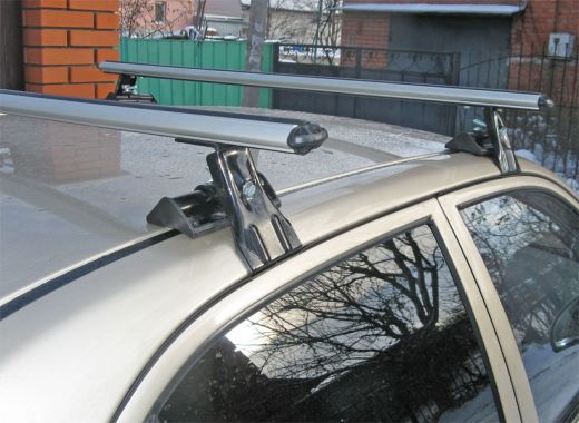 Универсальный багажник на крышу Муравей Д-1, на Hyundai Accent, аэродинамические дуги