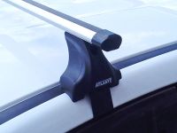Багажник на крышу Renault Fluence, Атлант, аэродинамические дуги Эконом, опора Е