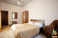 кровать в номере в гостинице нирвана