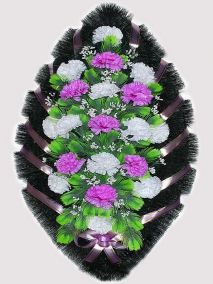 Фото Ритуальный венок из искусственных цветов #7 фиолетово-белый из гвоздик и зелени
